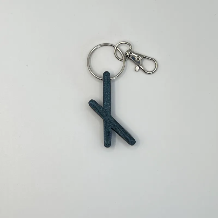 Porte clés Rune Nauthiz