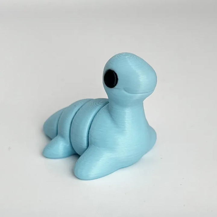 Fidget - Animal mignon articulé - Montre du Loch Ness