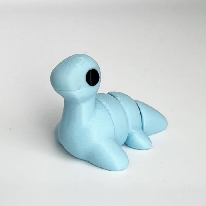 Fidget - Animal mignon articulé - Montre du Loch Ness